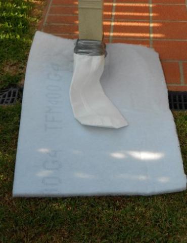 Filter sock on downpipe with filter membrane beneath it